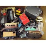 Model Railways - a box containing a collection of O gauge and OO gauge rolling stock, locomotives,