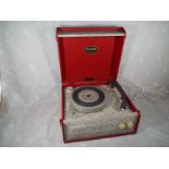 A Dansette Popular portable record player, red,