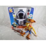 A Disney Pixar Toy Story and Beyond Buzz Lightyear Space Exploder with light, sound,
