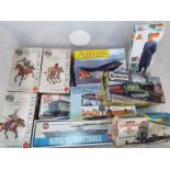 A collection of Airfix model kits to include The Polish Lancer, HO and OO gauge scale mineral wagon,