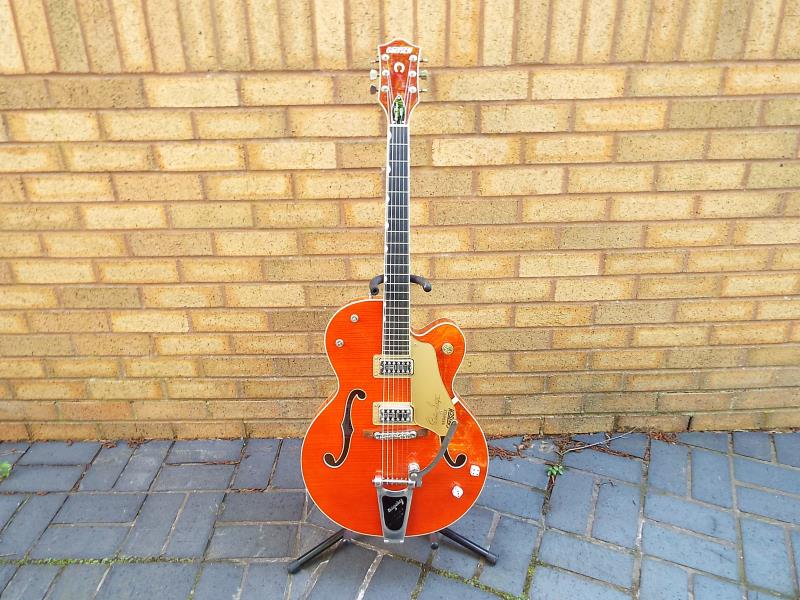 A Gretsch Brian Setzer semi-acoustic guitar, translucent amber finish, model G6120SSU, serial No. - Image 7 of 8