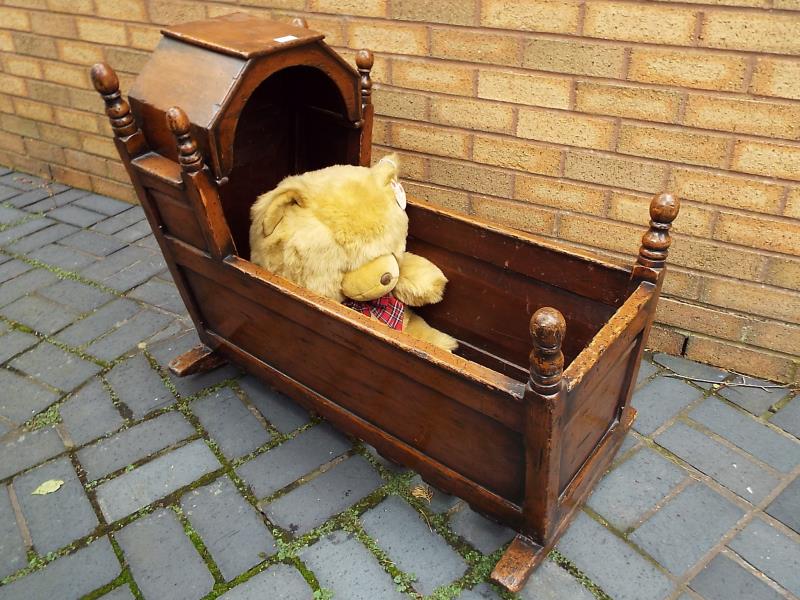 A child's period cradle with hinge cover (bear not included) - Est £80 - £120