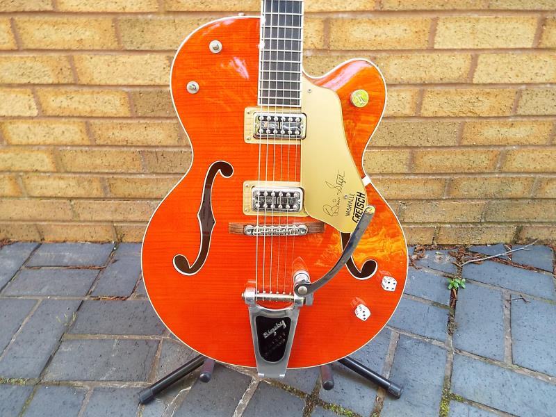 A Gretsch Brian Setzer semi-acoustic guitar, translucent amber finish, model G6120SSU, serial No. - Image 2 of 8