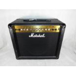 A Marshall MG30DFX 30 watt electric guitar amplifier,
