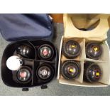 A set of Drakes Pride lawn bowls, boxed and a set of Drakes Pride lawn bowls with jack,