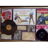 A montage of Elvis Presley memorabilia mounted and framed under glass,