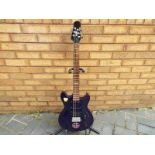 A 2009 Indie Festival guitar, solid mahogany body with purple lacquer and Indie Music Festival logo,