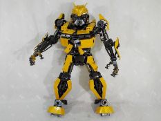 A hand made model Transformer depicting Bumblebee, issued in an exclusive edition,