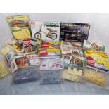 A collection of Airfix model kits to include OO - HO scale signal box, village church,