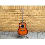 A Tanglewood bowl back acoustic guitar,