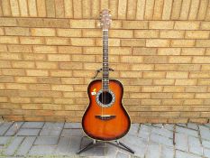 A Tanglewood bowl back acoustic guitar,