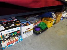 A very large mixed lot of toys to include good quality dressed dolls, bagatelle, board games,