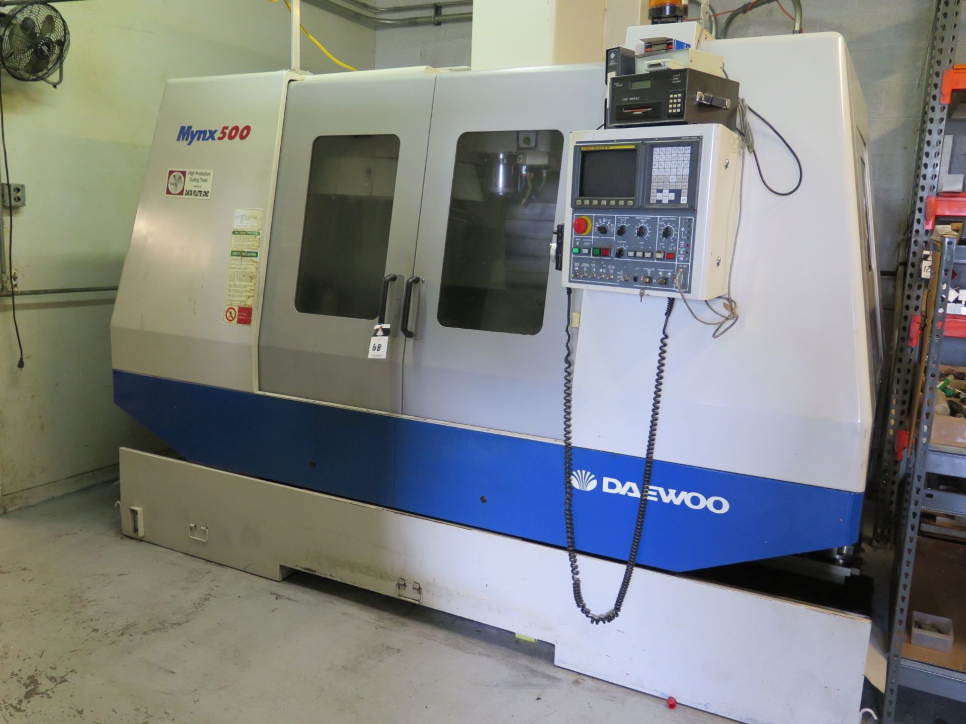 1999 Daewoo MYNX500 CNC Vertical Machining Center s/n AV5E-0076 w/ Fanuc Series 21-M Controls, 24-