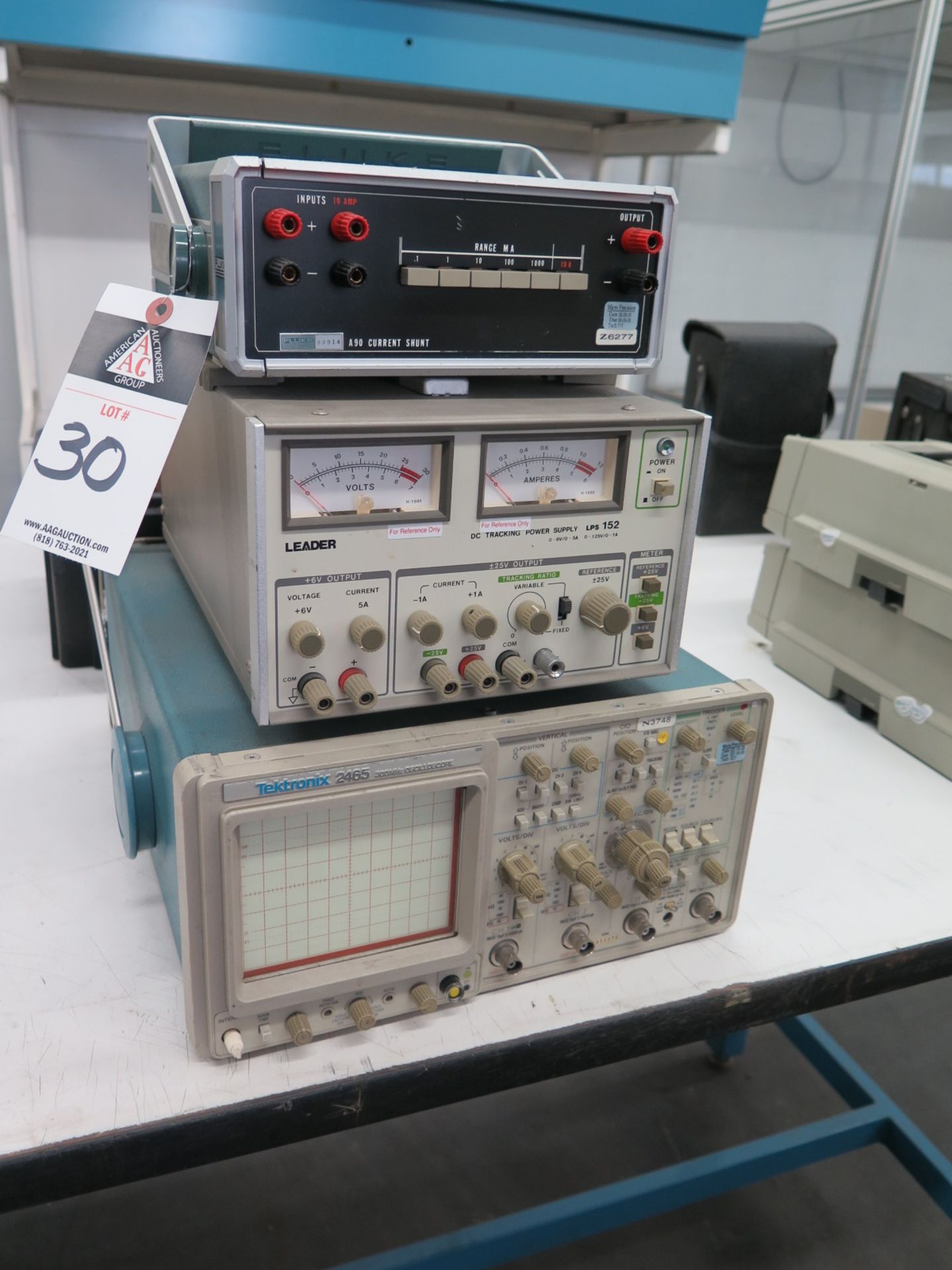 Tektronix mdl. 2465 300MHz Oscilloscope, Leader mdl. LPS152 DC Tracking Power Supply, Fluke mdl. A90