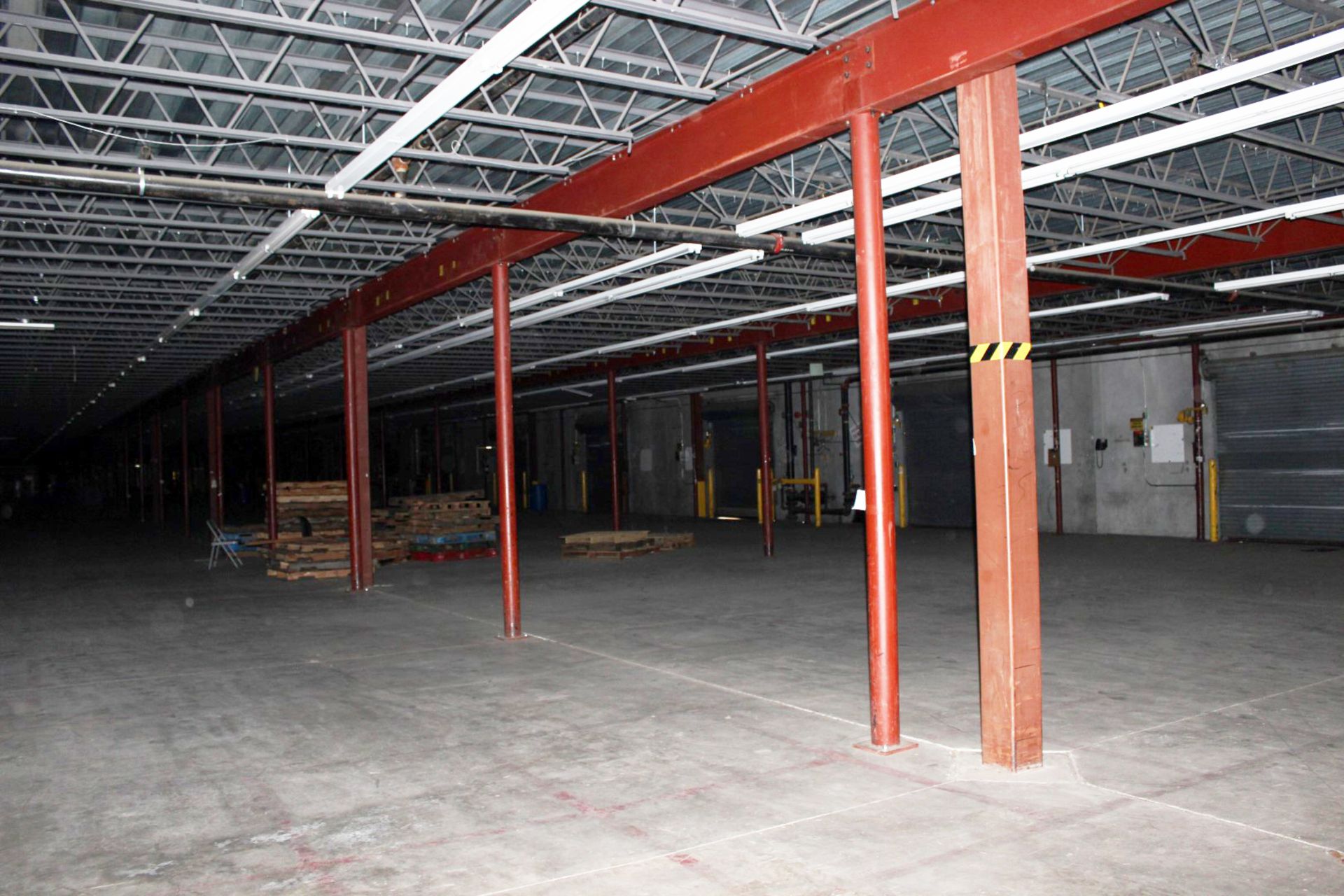 1200 SQ FT OF MEZZANINE WITH SOLID METAL FLOOR DECKING, (80' x 15')  COLUMN SPACING 240" X 180"