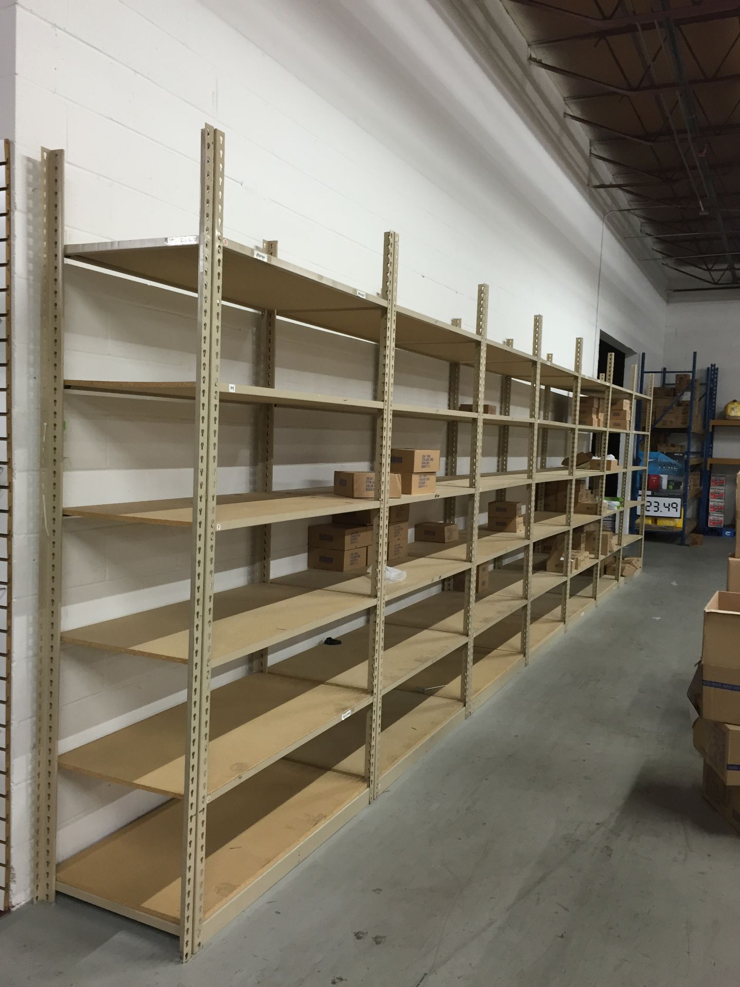 10 SECTIONS OF RIVETIER INDUSTRIAL SHELVING,  EACH SIZE 28"D X 65"W X 84"H, COLOR: MANILA, 5 SHELVES