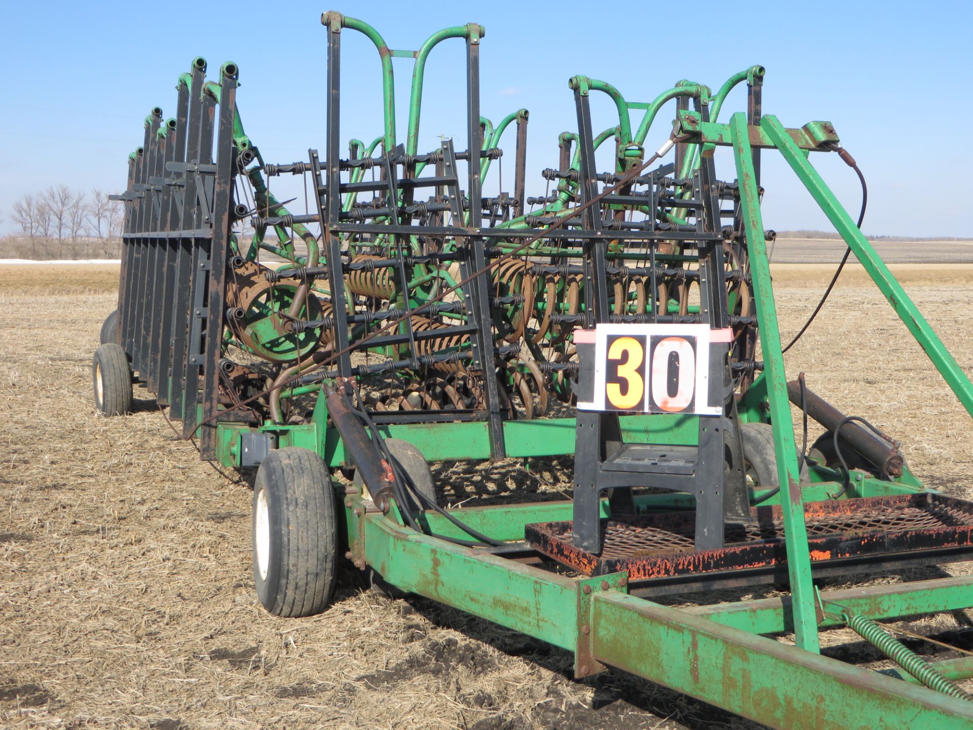 Flexicoil 60 Ft 4 bar tine harrow and P-20 packer bar, auto fold unit