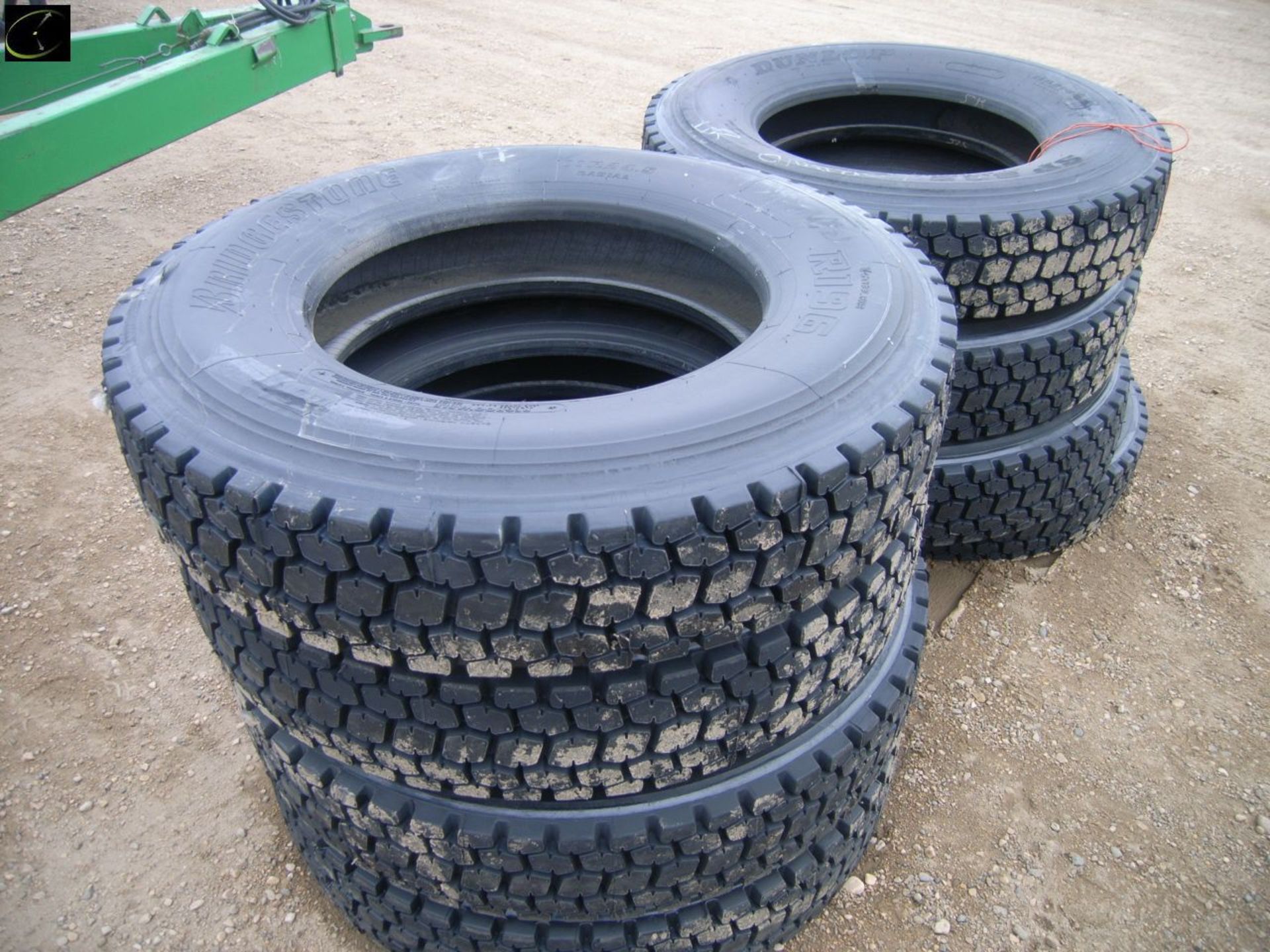 8 UNUSED 11/24.5 GRIP TIRES