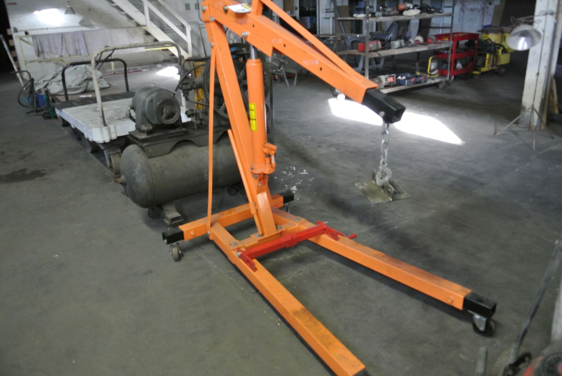 Central Hydraulics 2 Ton Engine Hoist with lift adapter and load leveler.