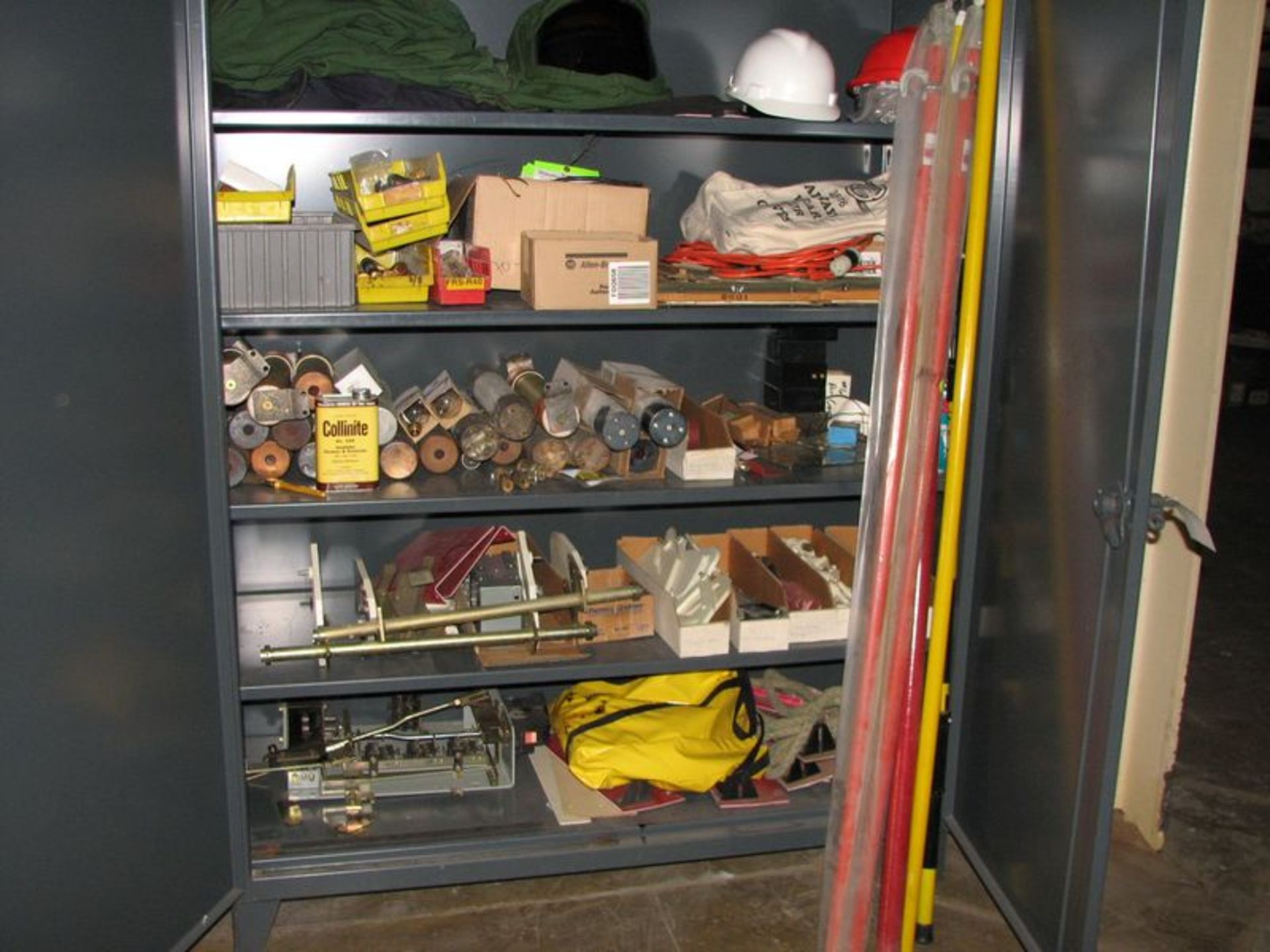 Lot Strong Hold heavy duty storage cabinets with misc; electrical, fuses, hot-sticks, gloves, suit