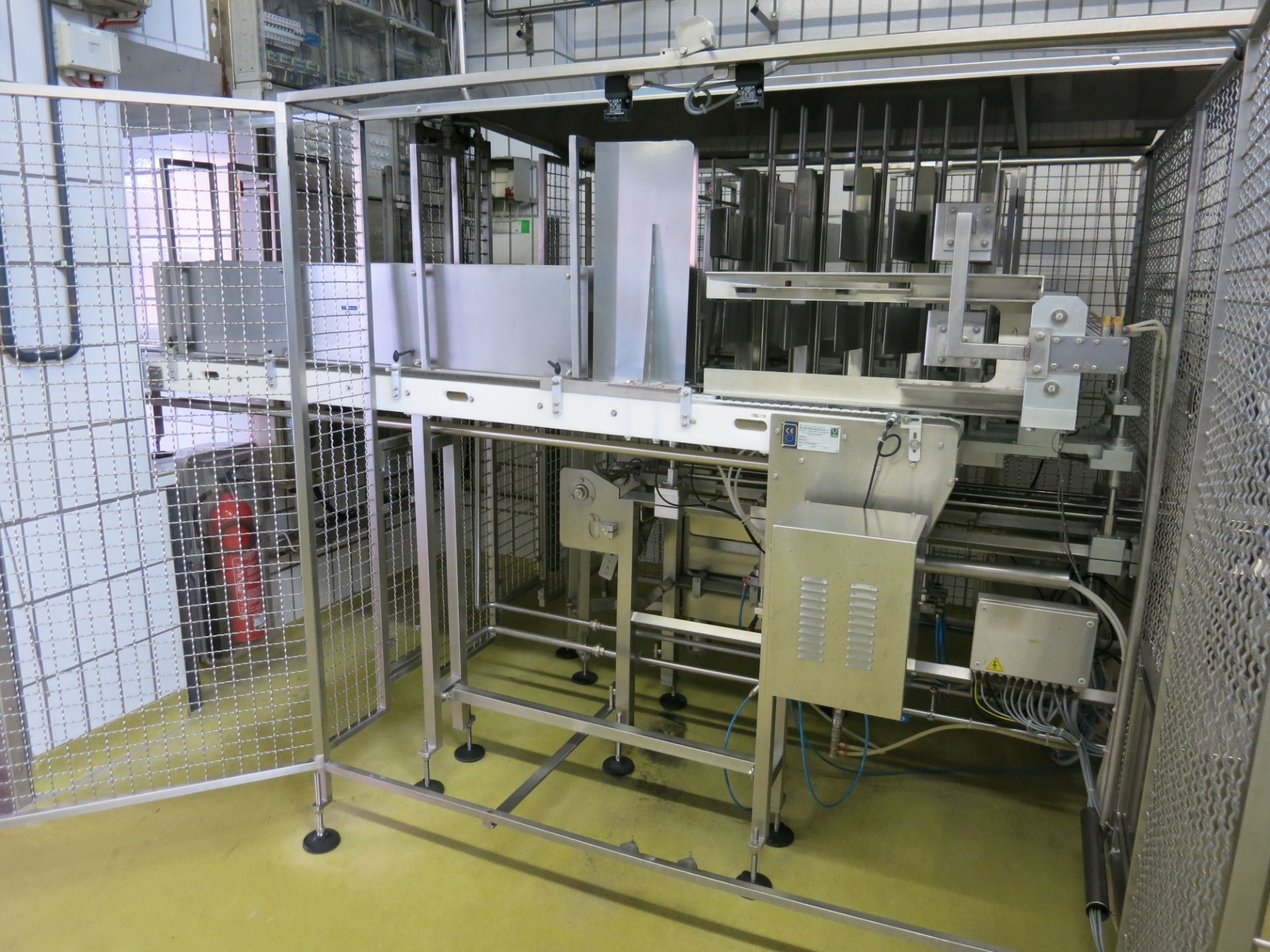 Mondini cup feeder/singulator