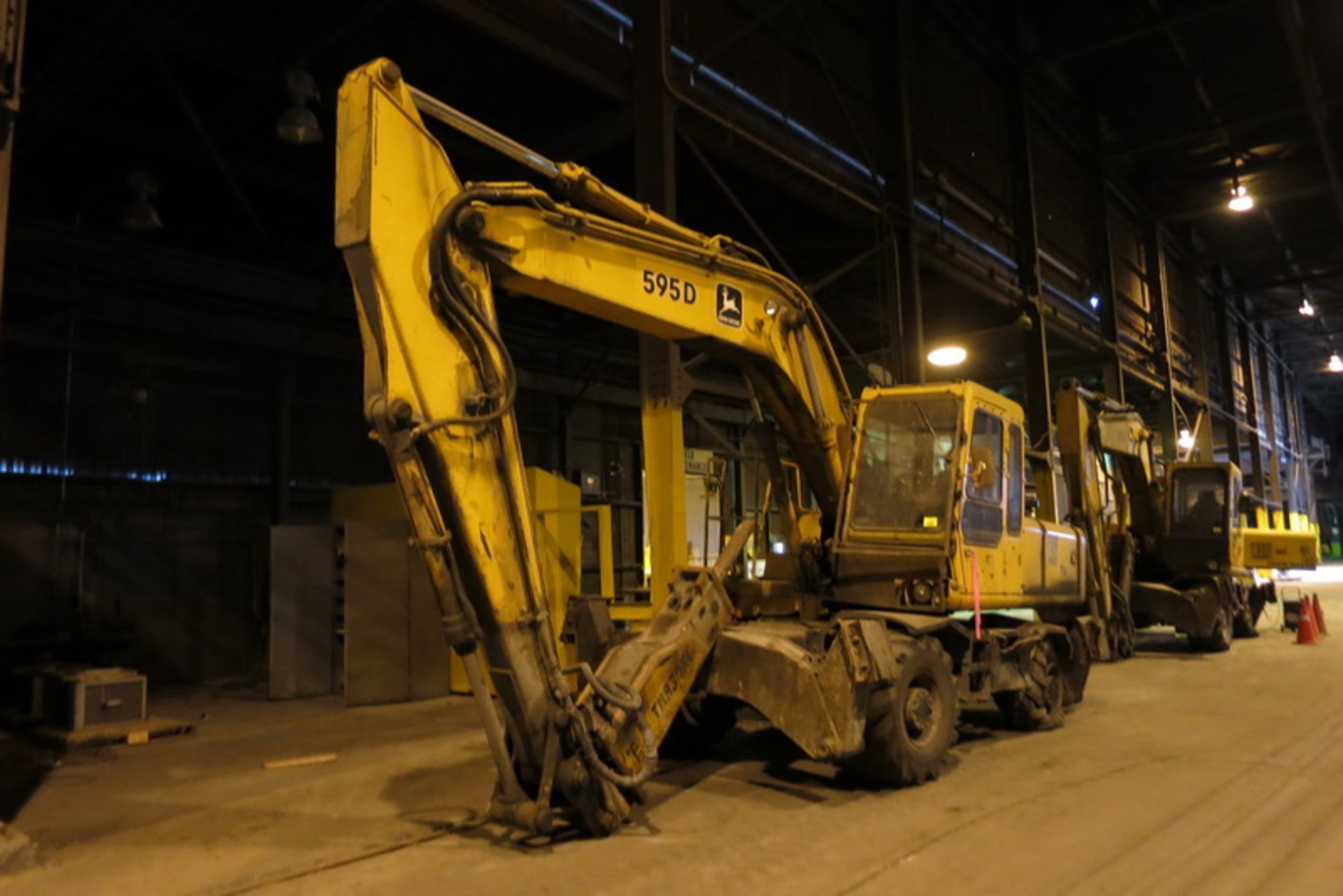 John Deere excavator, model 595D, s/n FF595DS001123, with hydraulic hammer (located outside of