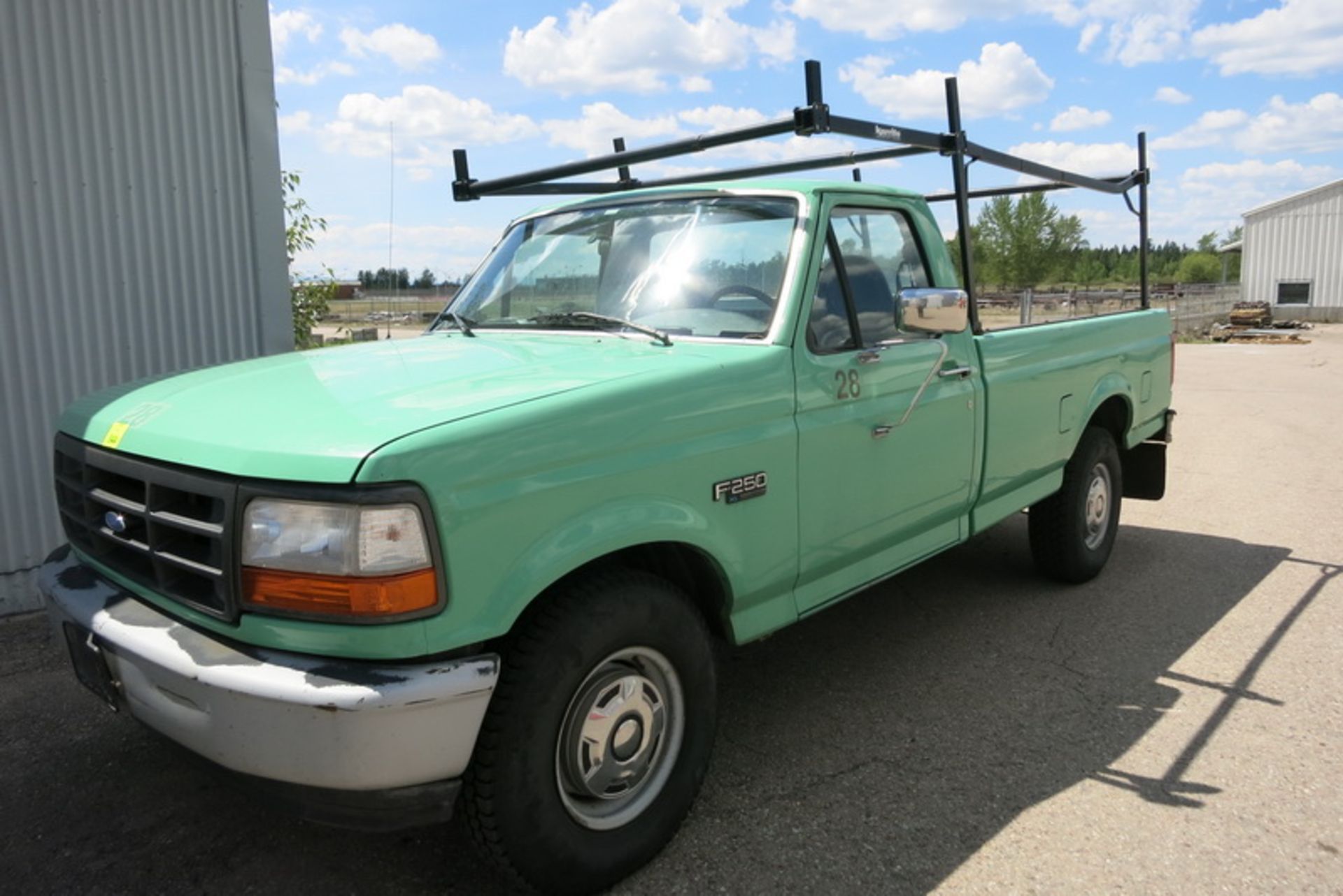 1996 Ford F250 pickup truck, with Karrite lumber rack VIN: IFTEF25N9TLC54147, Lic: 712799B (MT) [