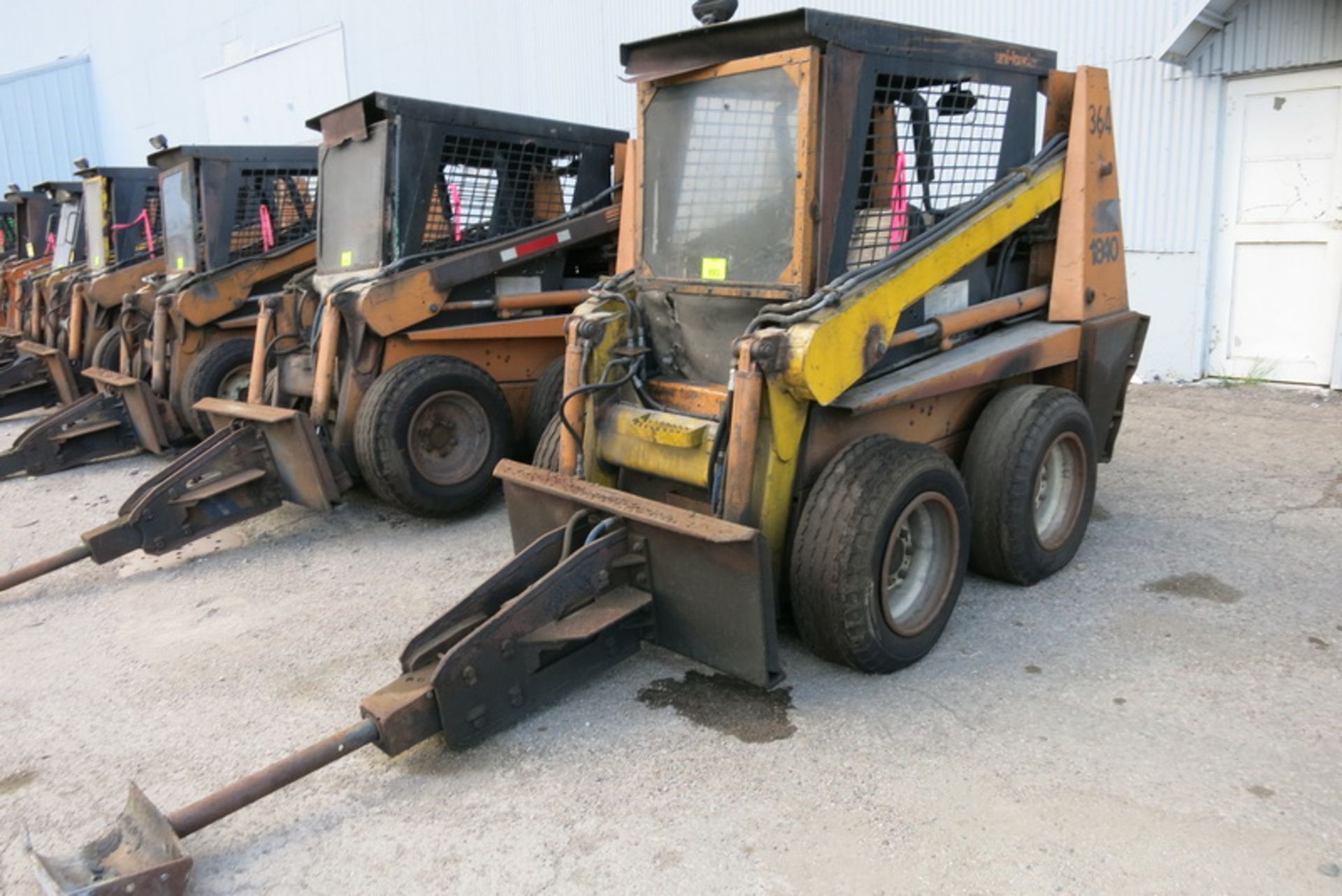 Case uniloader skid steer, model 1840, s/n JAF0235009, with hammer attachment, (5615 hrs.)  [