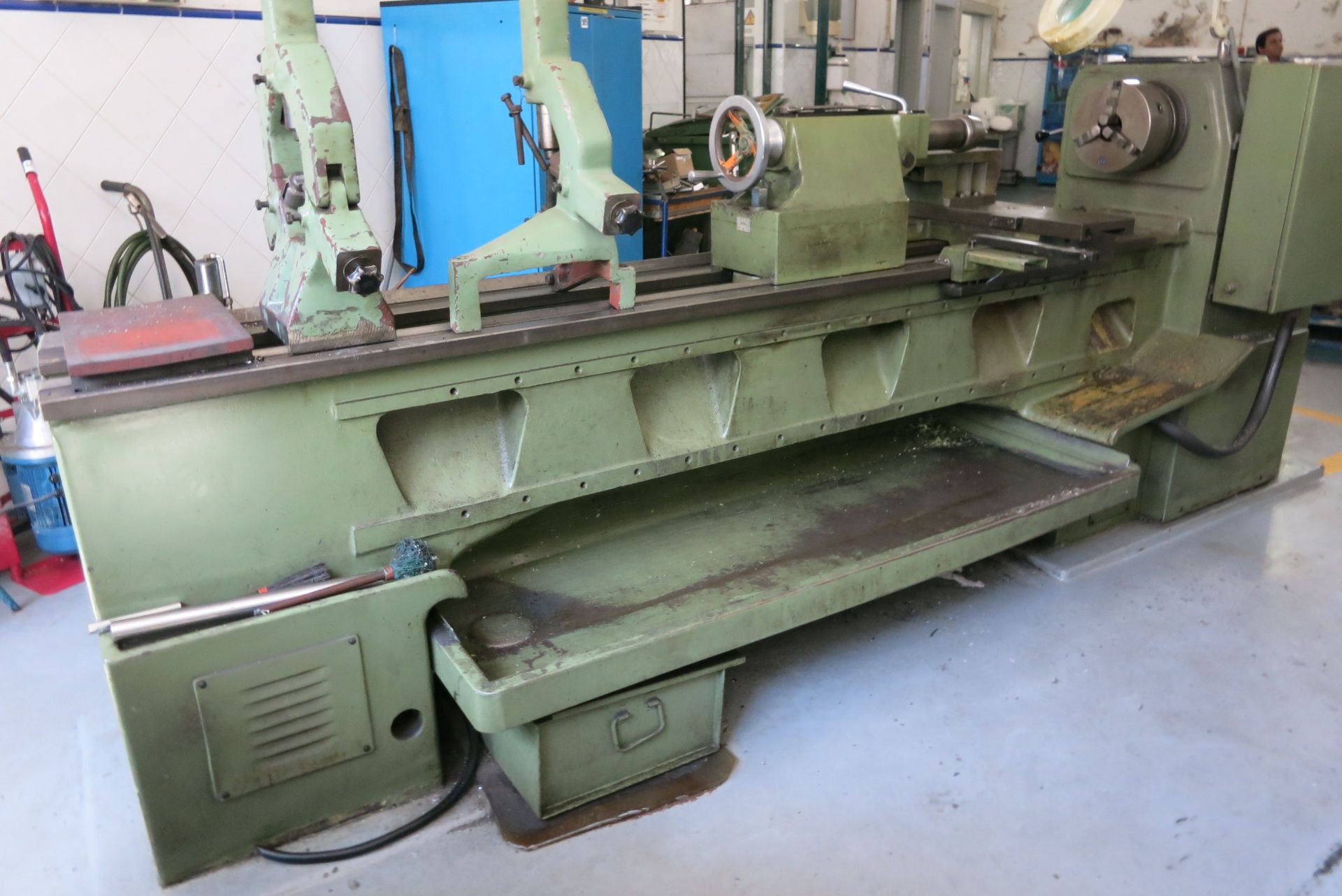 ZMM lathe, model CU582, with 3 jaw chuck, center point, steady rest and tooling in 2 cabinets, (with