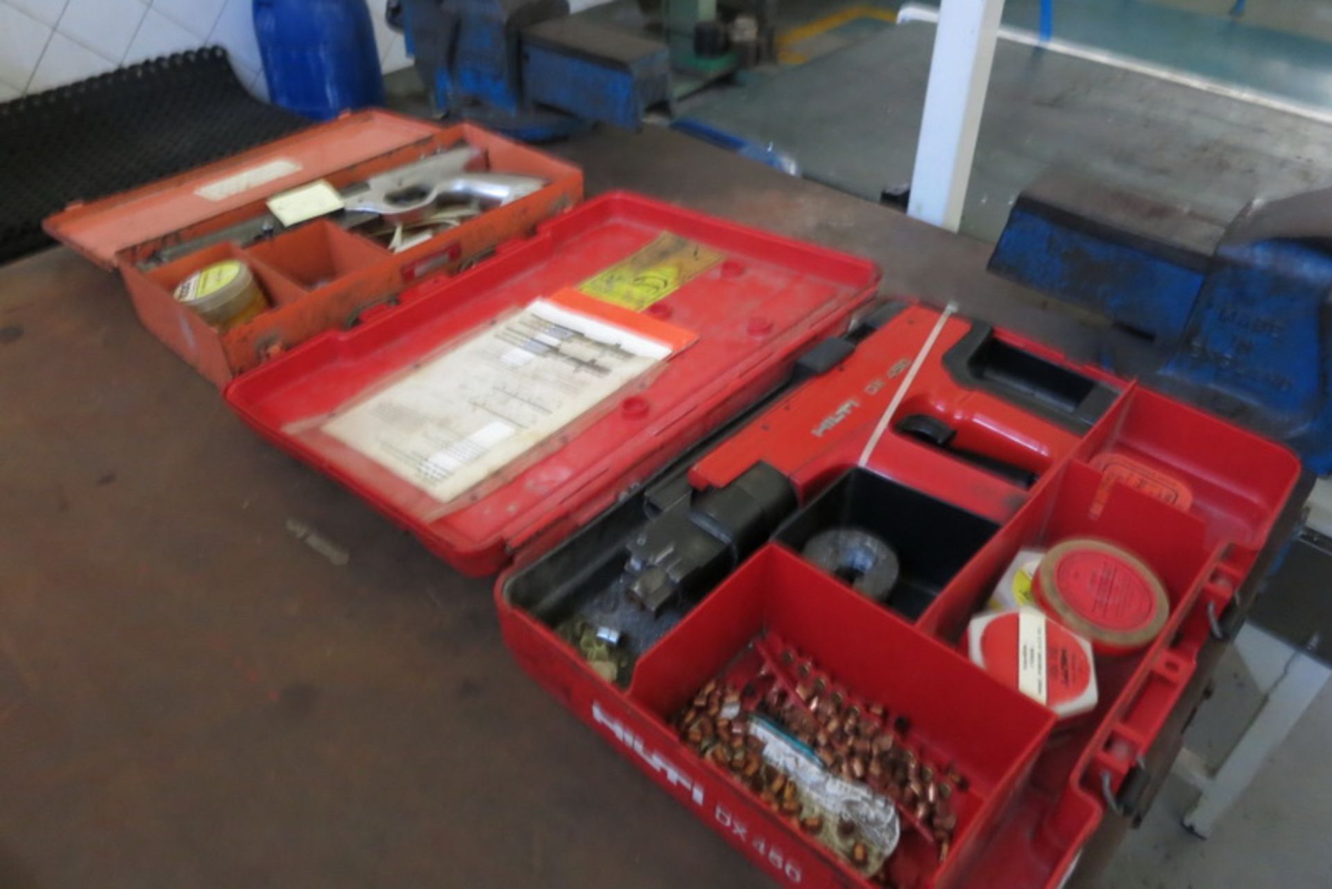 (2) Power fastner guns, (1) Hilti DX450, (1) Condisa OBO