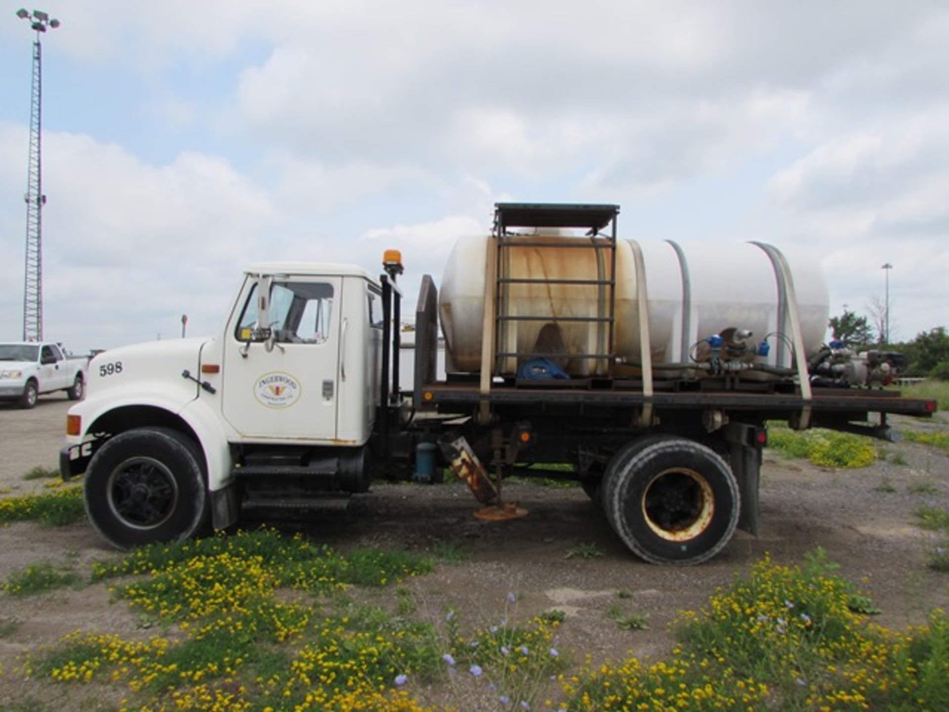 1992 International "4700" flatbed truck c/w 4 X 2 traction, automatic transmission, skid mount water - Image 3 of 6