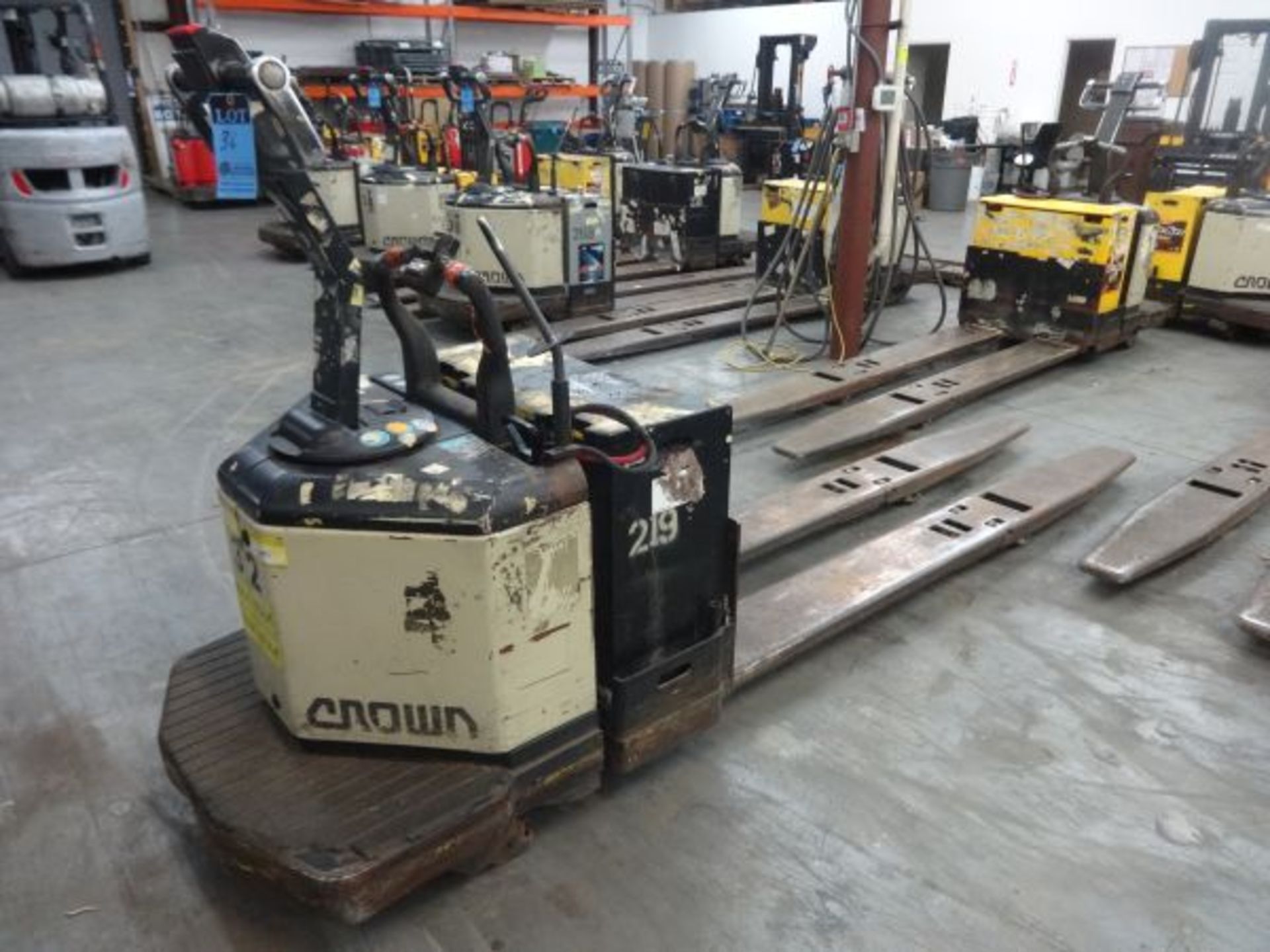 8,000 LB CROWN MODEL PE3540-80 DUAL PALLET LENGTH END RIDER ELECTRIC PALLET TRUCK; S/N 6A155940,