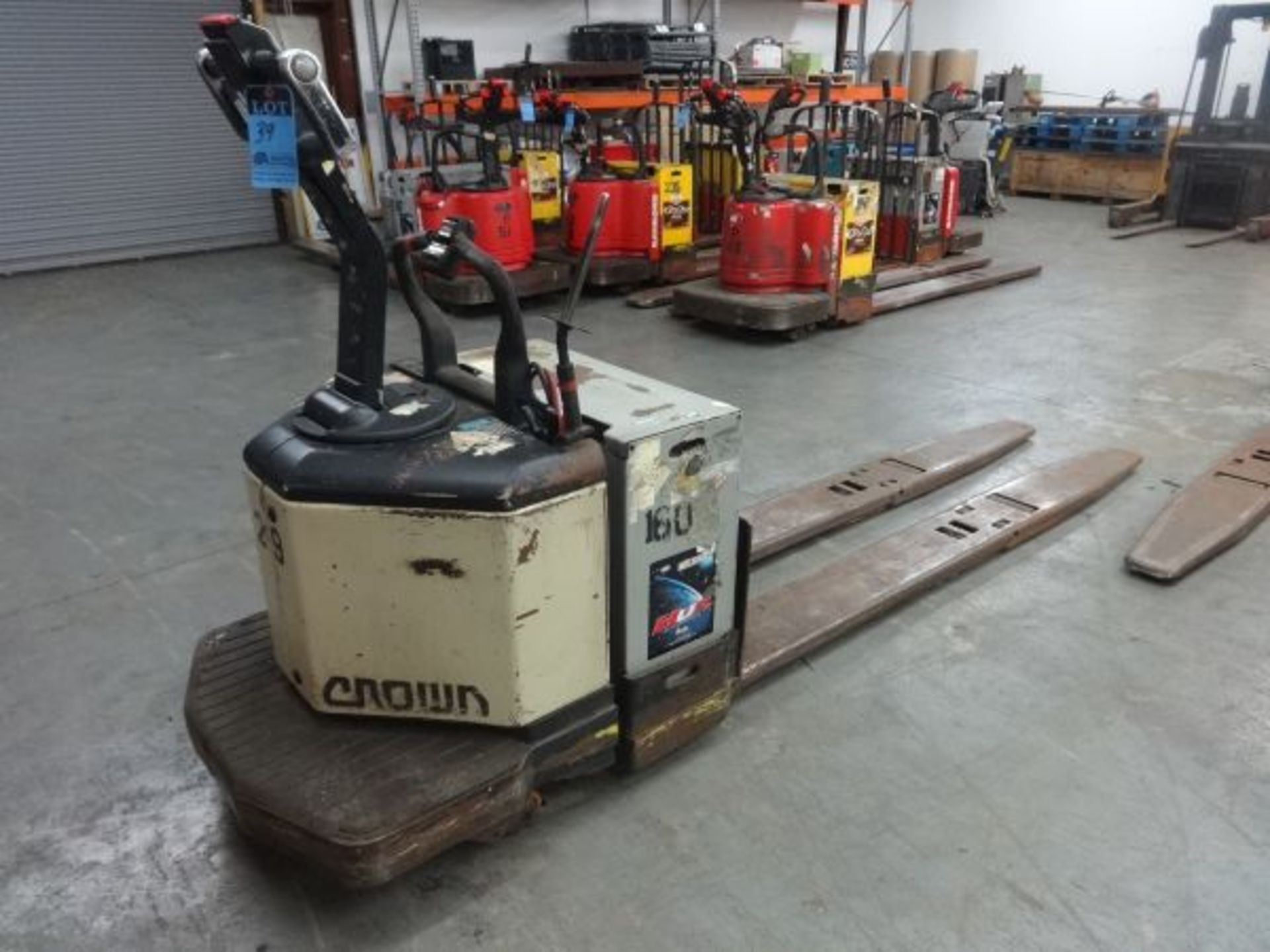 8,000 LB CROWN MODEL PE3540-80 DUAL PALLET LENGTH END RIDER ELECTRIC PALLET TRUCK; S/N 6A155971,