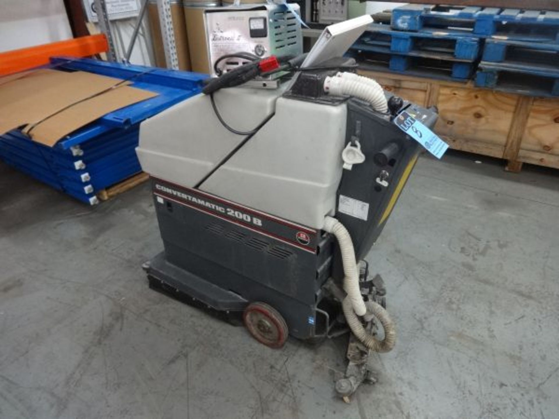 ADVANCE MODEL CONVERTAMATIC 200B WALK BEHIND ELECTRIC SCRUBBER; S/N 1280238, W/ LESTRONIC CHARGER