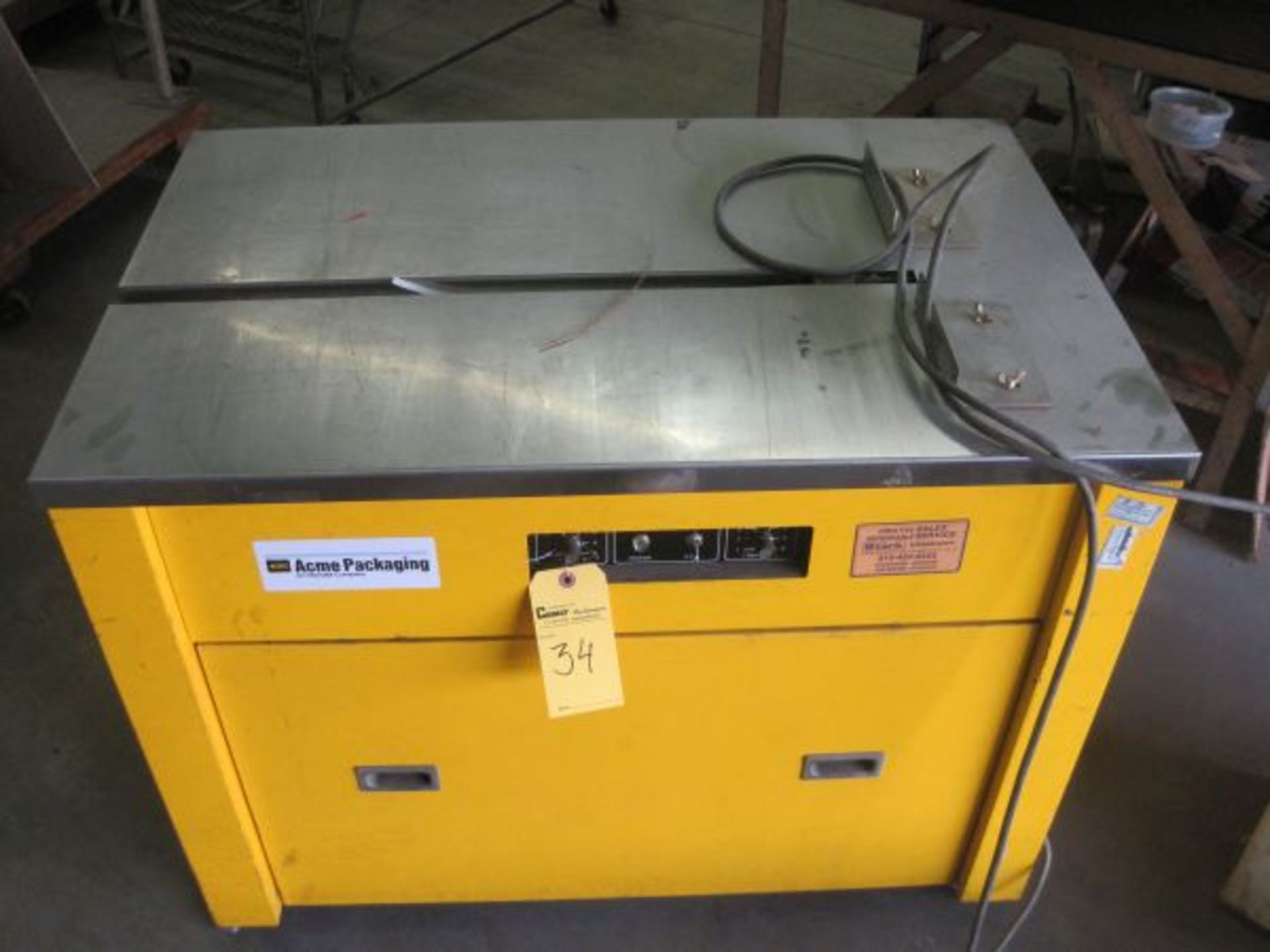 Acme Packaging Strapping Machine