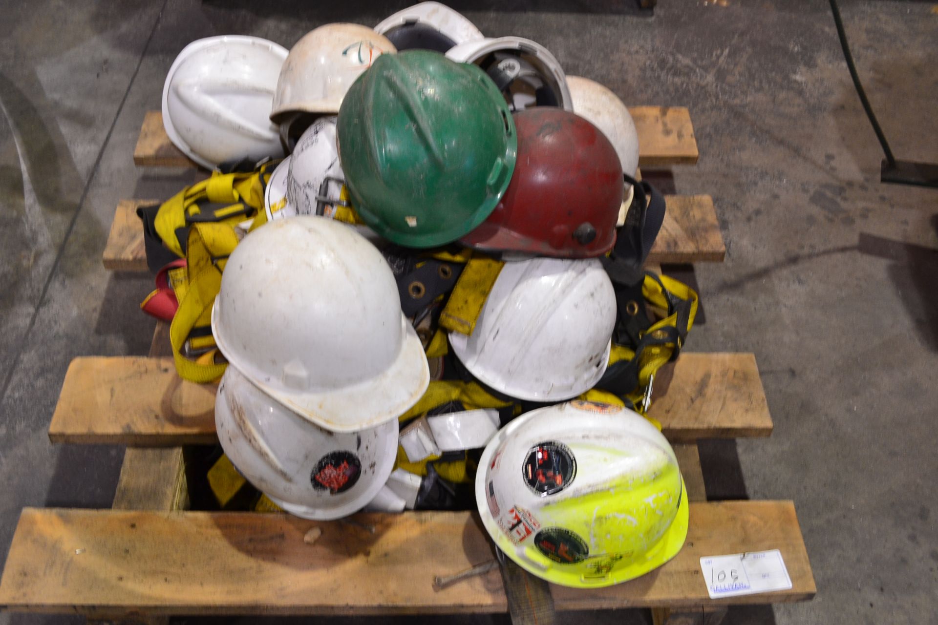 SKID OF HARD HATS AND SAFETY HARNESSES
