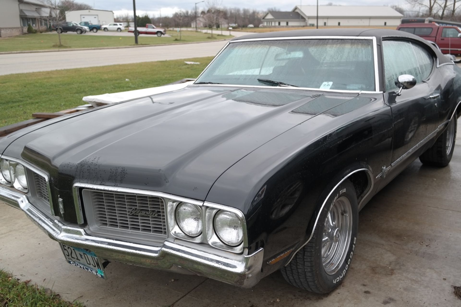 BLACK OLDSMOBILE CUTLASS