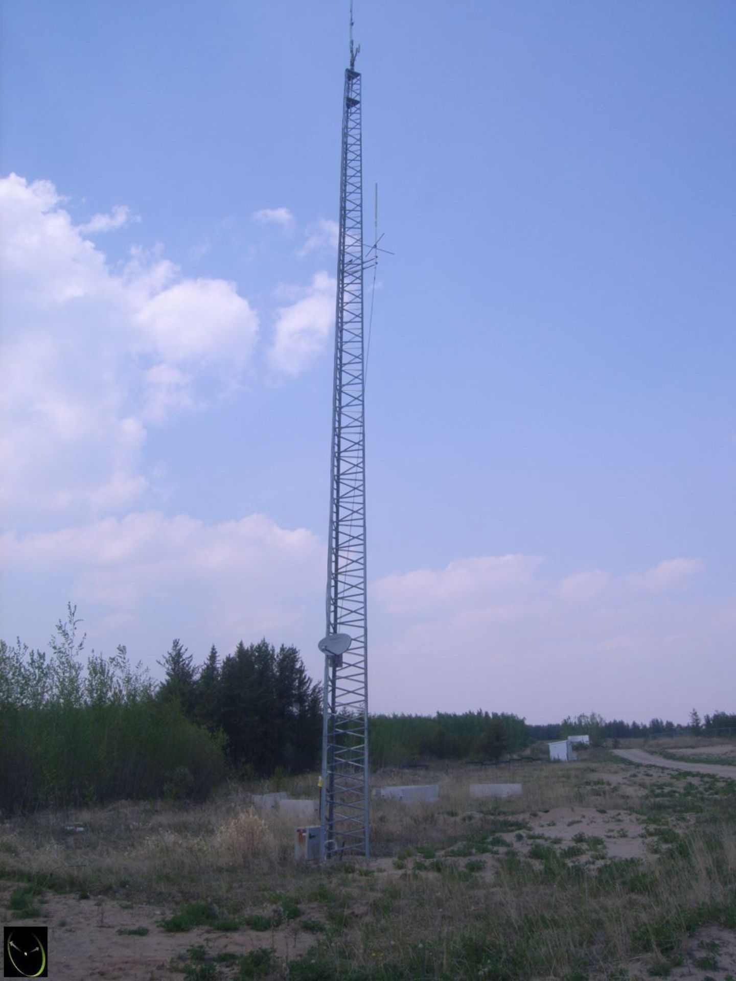 Approx. 60 To 70 Ft. Free Standing Steel Tower w/ Misc. Antennas.