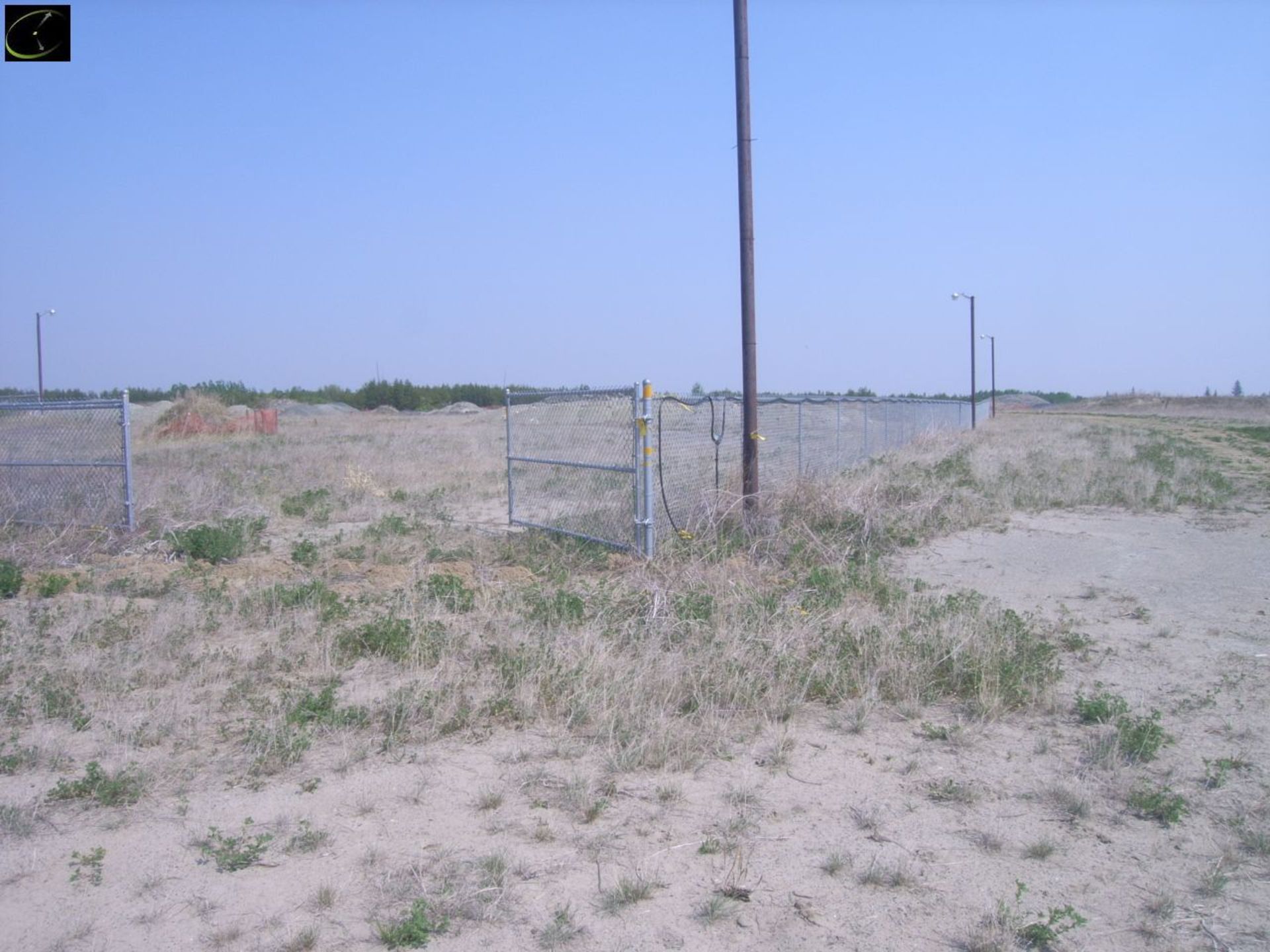 Approx. 900 Meters Of Chain Link Fencing w/ Misc. Gates. Posts Are Cemented In The Ground