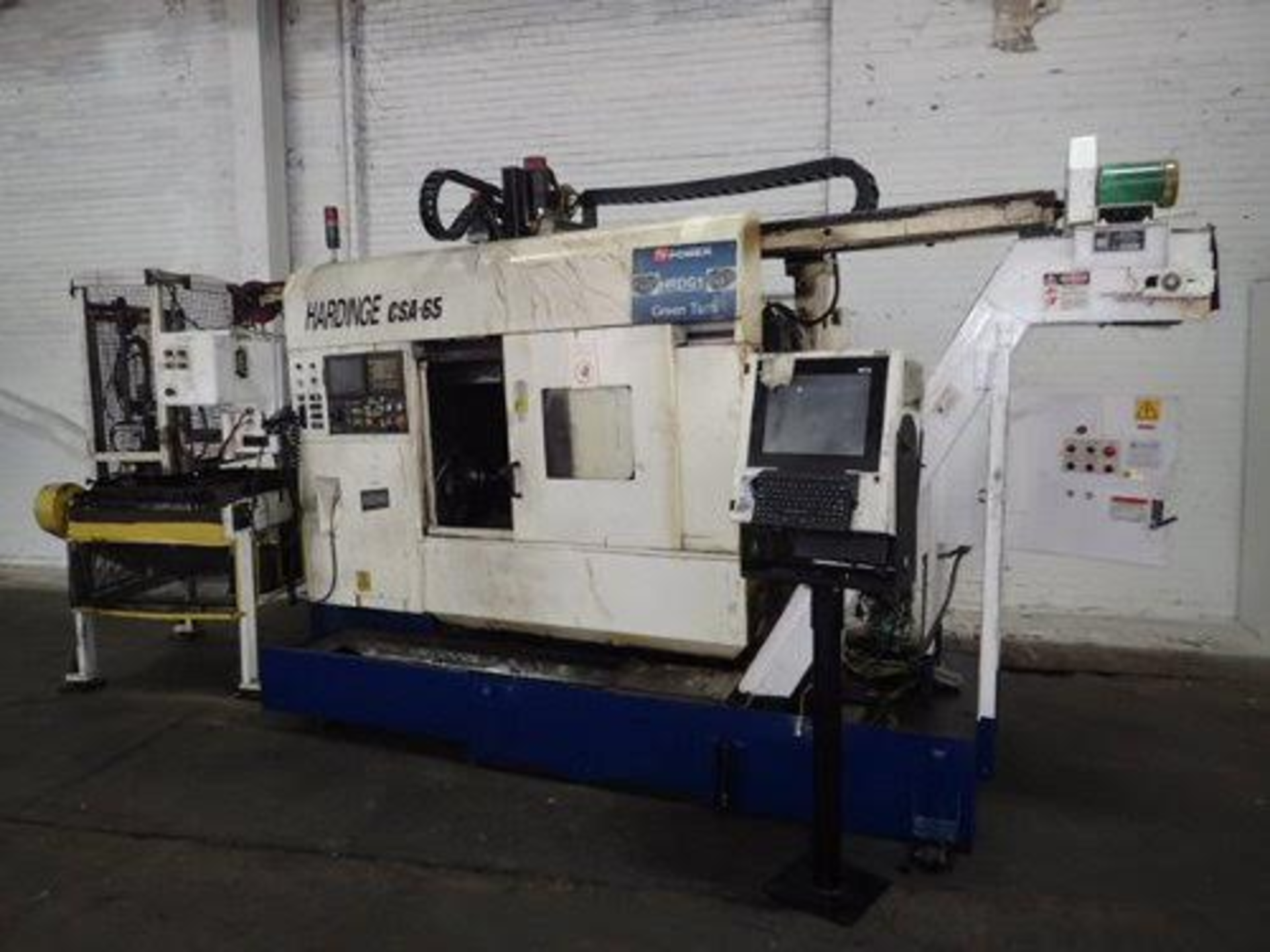 HARDINGE MODEL CSA 65 CNC LATHE WITH LOADER, 1999, LOCATION MI, BUYER TO LOAD AND SHIP