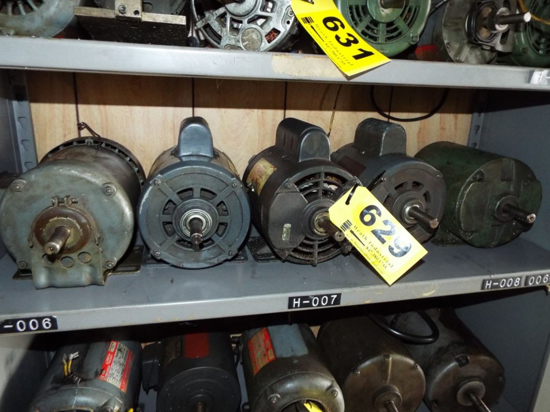 ASSORTED ELECTRIC MOTORS ON ONE SHELF