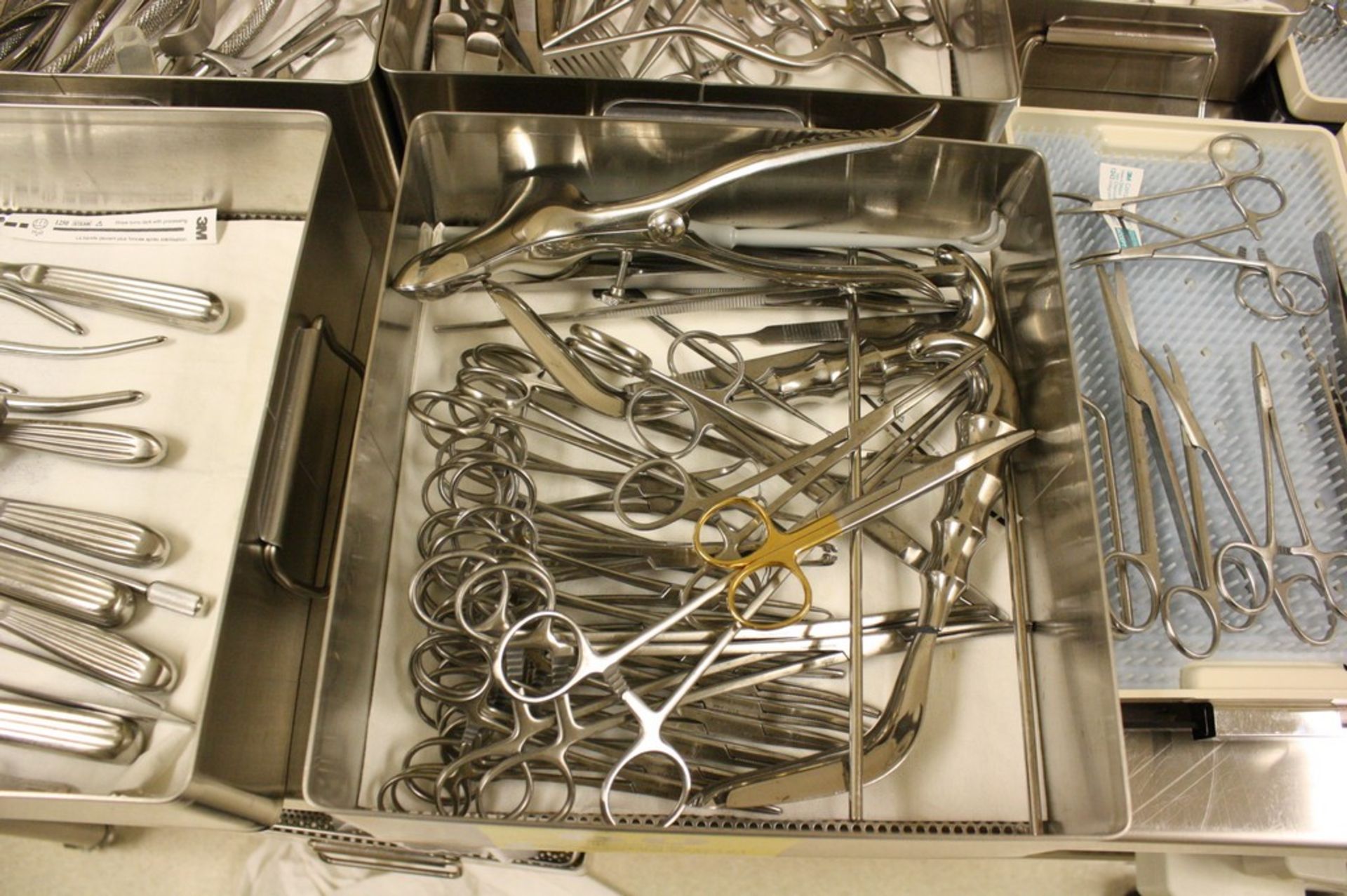 SURGICAL FORCEPS, ETC IN STERILIZATION TRAY