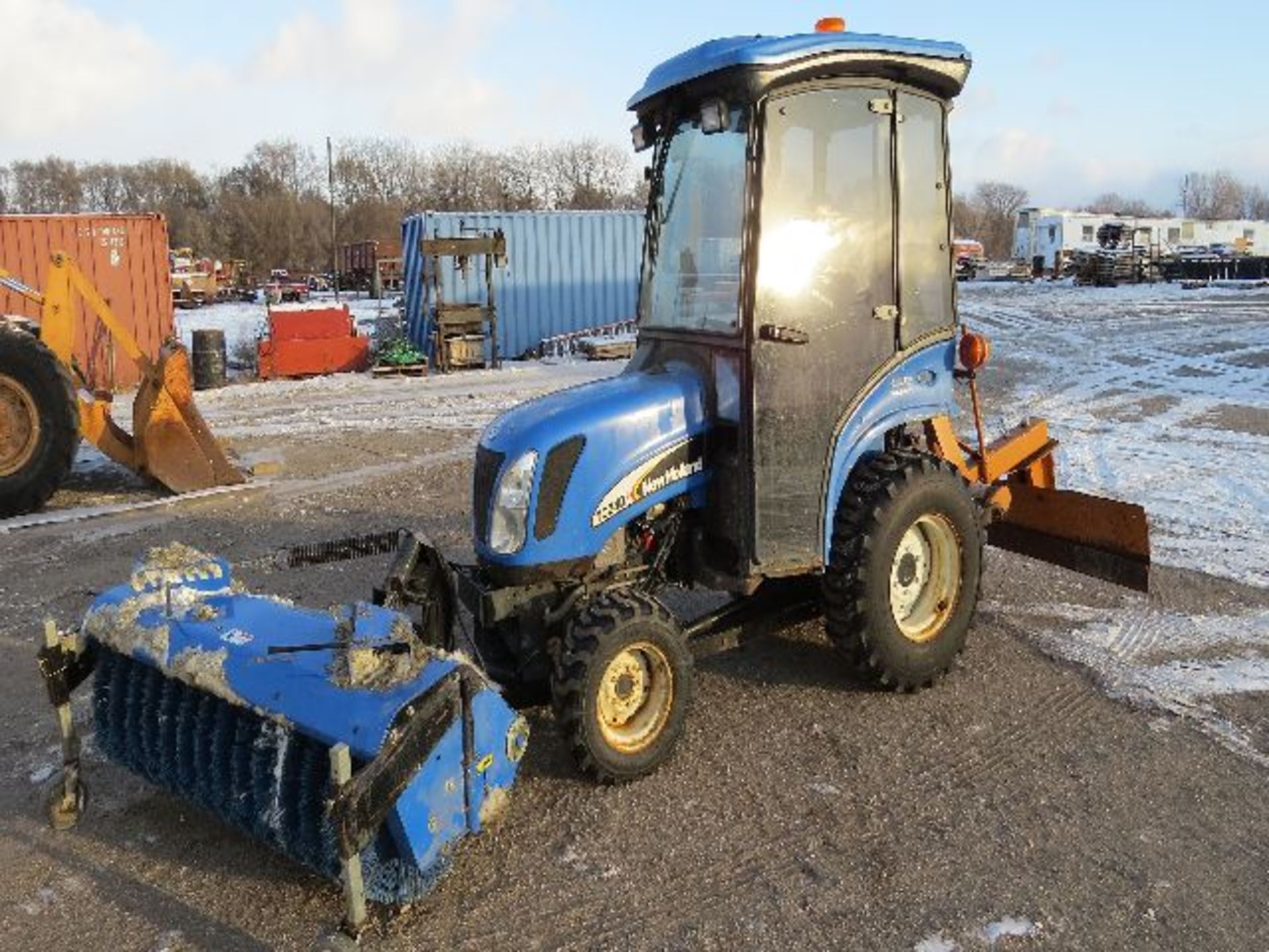 2004 New Holland model  TC24DA tractor, sn HG10183, 260 hrs. on meter, front wheel assist, cab,