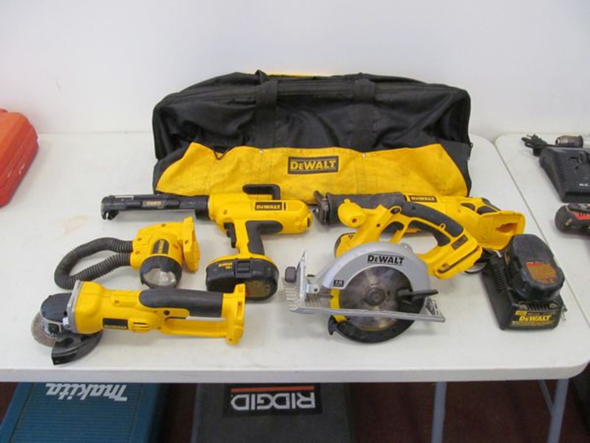DeWalt Cordless Powered Hand Tools , to Include: (1) Reciprocating Saw(1) Disc Grinder(1) Circular