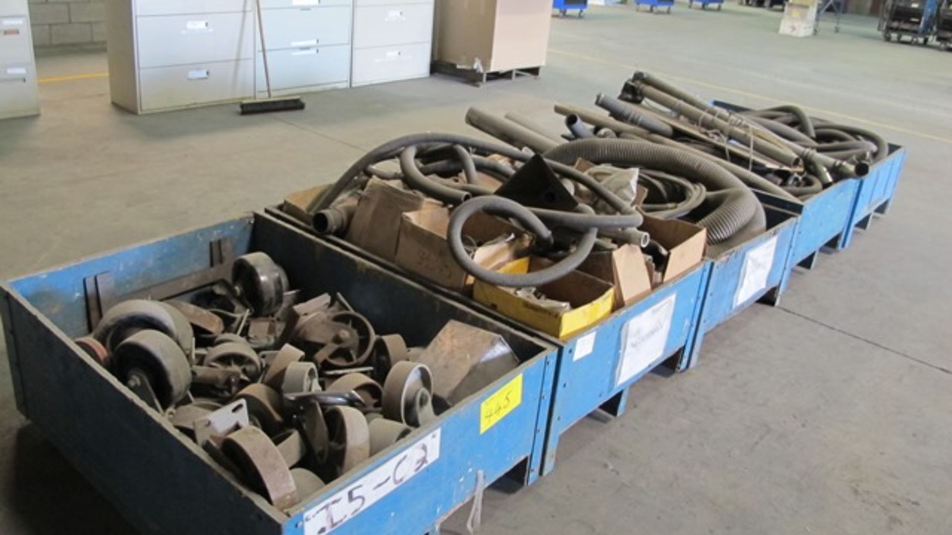 WOOD CONTAINERS OF METAL CASTERS, OPARTS, WIRE AND VACUUM HOSES