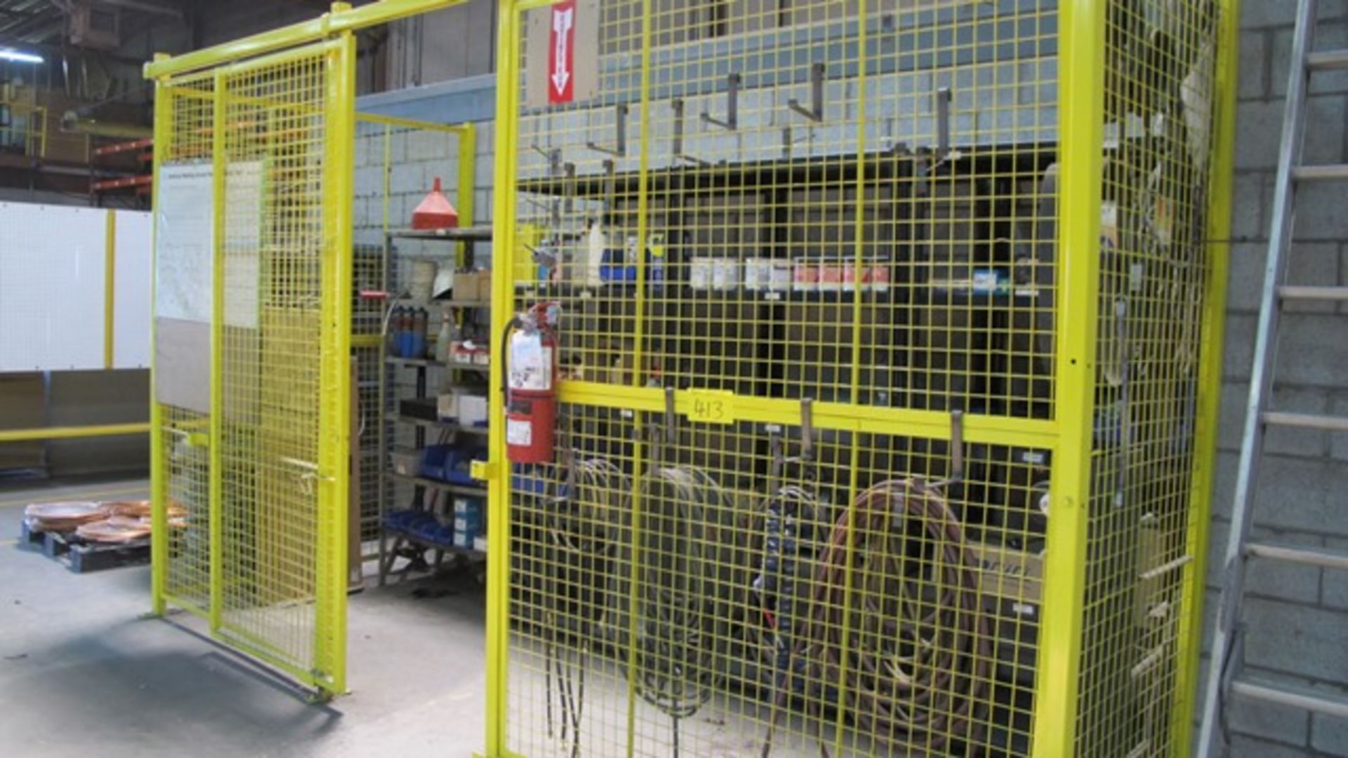 14' YELLOW MAINTENANCE CAGE W/SLIDING DOOR AND ALL CONTENTS OF CAGE (SUPPLIES, 4 SHELVING UNITS,