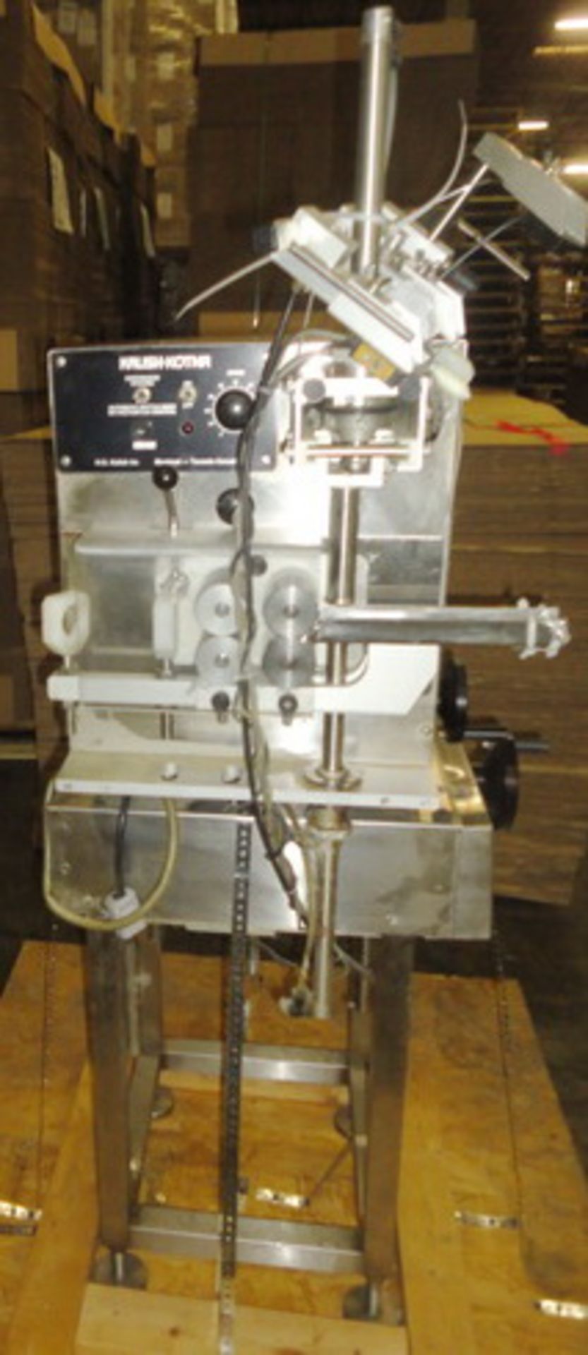 Kalish Automatic Cottoner, Model KOTNR-100, type 8400. Includes pneumatic bottle indexing.