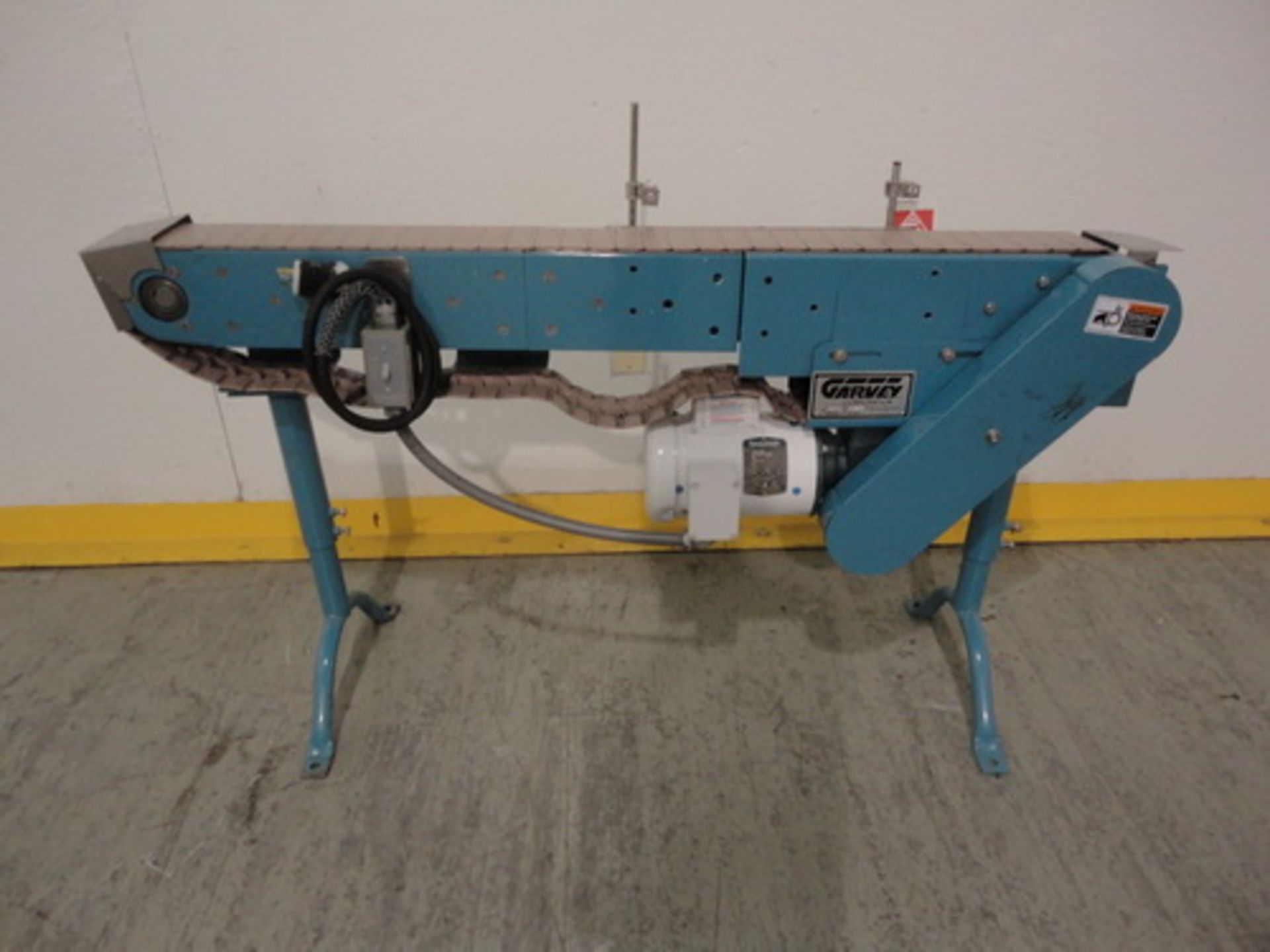 Garvey 5’ Table Top Chain Conveyor, Model 3600, S/N 18266. ½ HP (1/60/110-220V) motor.