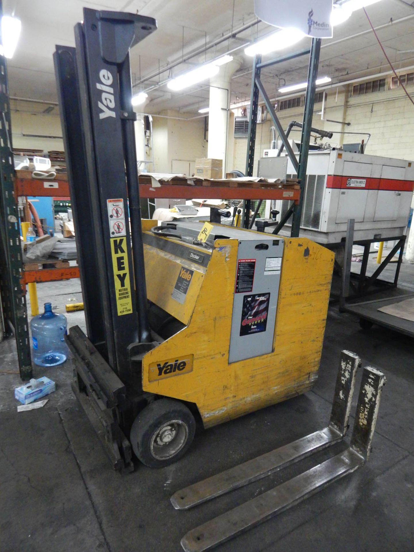 YALE MDL. ESCO25ABN24SV083 2500# CAPACITY STAND-UP RIDING TYPE ELECTRIC FORKLIFT TRUCK, WITH 126''