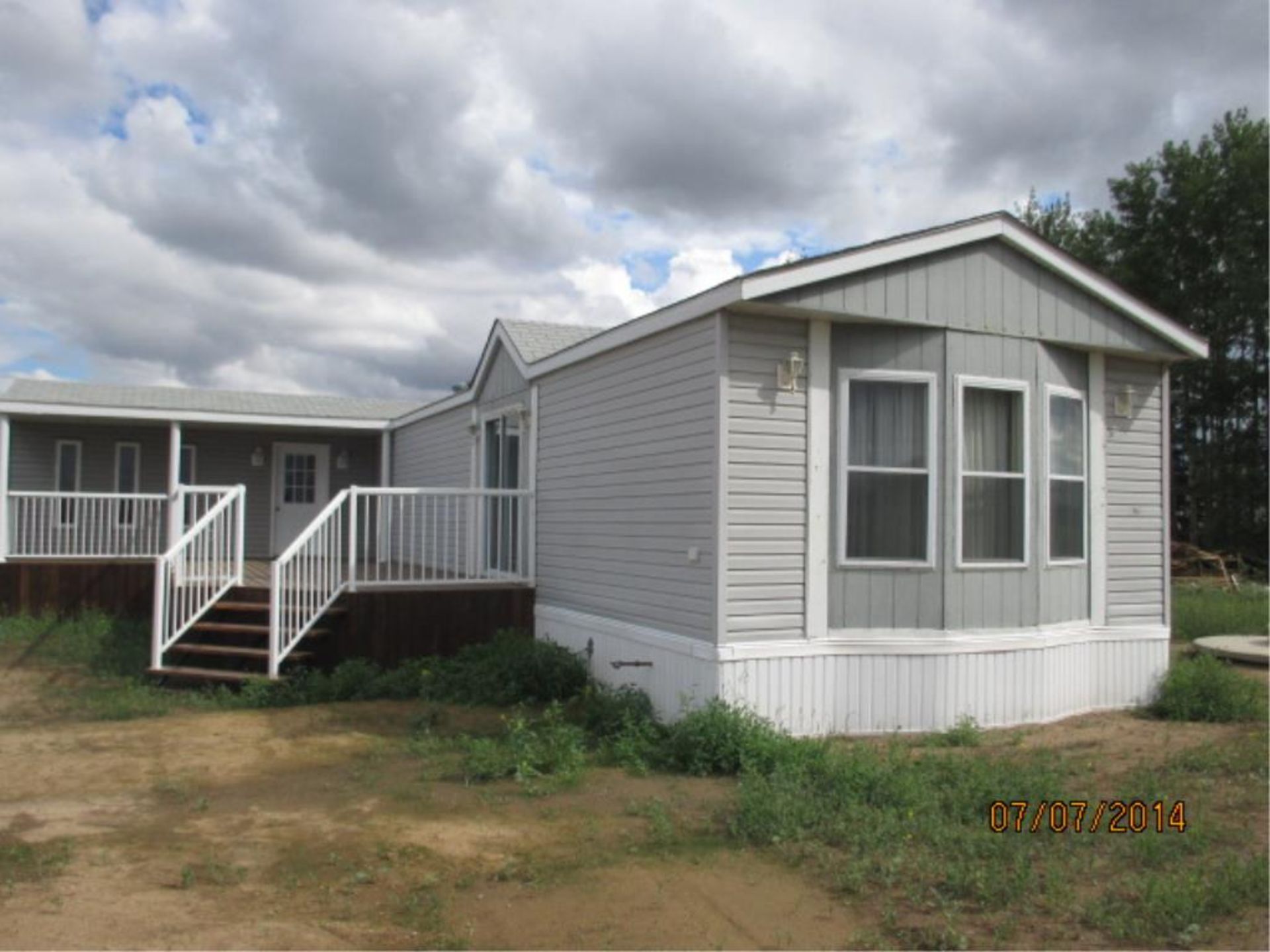 10 Acre Acreage C/W 1994 16 X 80 Living Room Fron Large partially covered deck; 3-Bedrooms in - Image 15 of 15